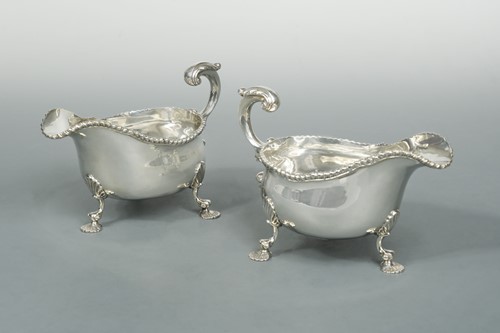 Lot 361 - A pair of oversized Victorian silver sauceboats