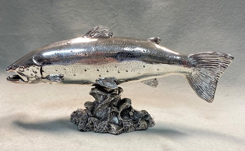 Lot 280 - A modern and realistic silver model of a salmon