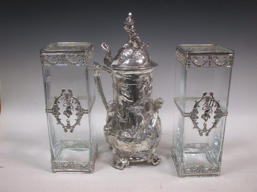 Lot 182 - A modern silver plated lidded jug in the late...