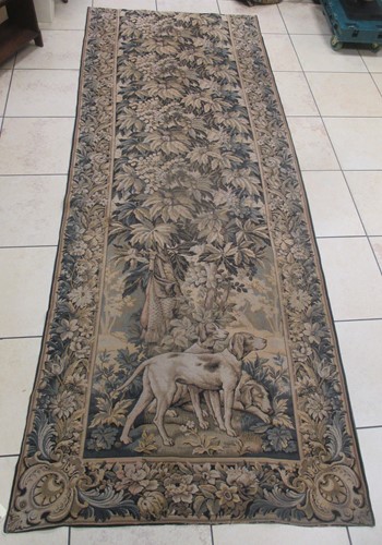 Lot 132 - A pair of machine made tapestries with dogs,...