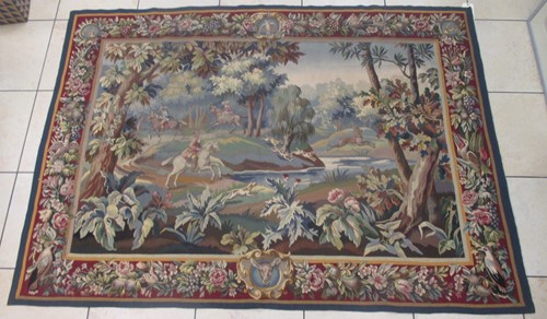 Lot 134 - Two machine made tapestries with hunting...