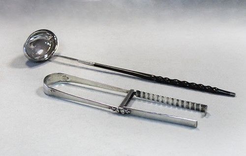 Lot 345 - A pair of George III 18th century silver sandwich tongs and a silver punch ladle of the same era