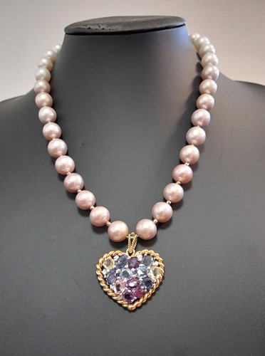 Lot 162 - A multi-coloured sapphire and diamond set heart pendant on an edison pearl necklace