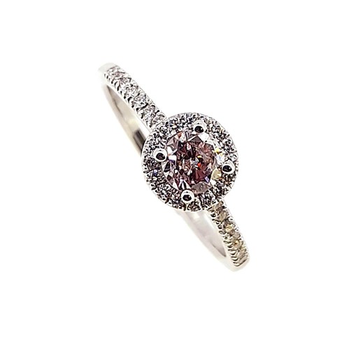 Lot 188 - A pink and white diamond halo cluster ring