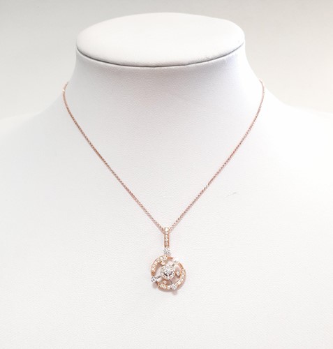 Lot 158 - A diamond and pearl set 'petit tourbillon' pendant and chain
