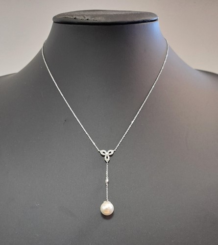 Lot 126 - A pearl and diamond negligée style pendant necklace