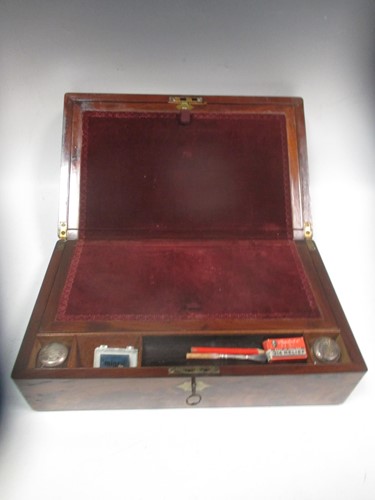 Lot 11 - A Victorian flame mahogany writing slope