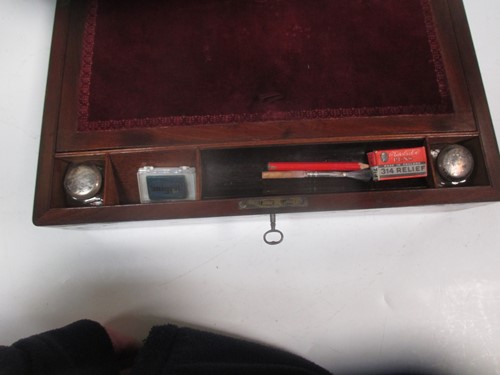 Lot 11 - A Victorian flame mahogany writing slope
