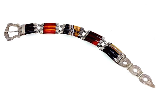 Lot 1 - An agate bracelet and two brooches in the Scottish style