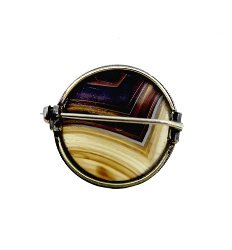 Lot 1 - An agate bracelet and two brooches in the Scottish style