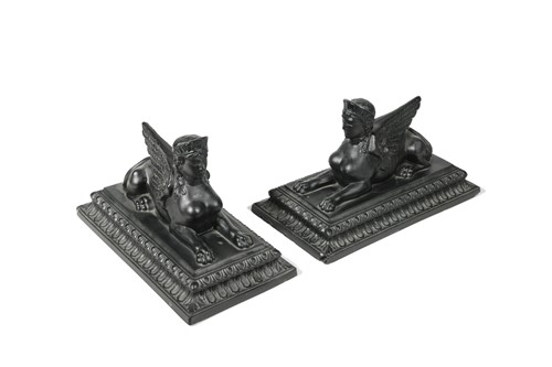 Lot 244 - A rare pair of John Derbyshire pressed glass figures of a Theban Sphinx, circa 1876