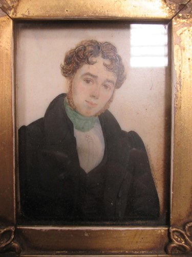 Lot 327 - A 19th century portrait miniature of a young...