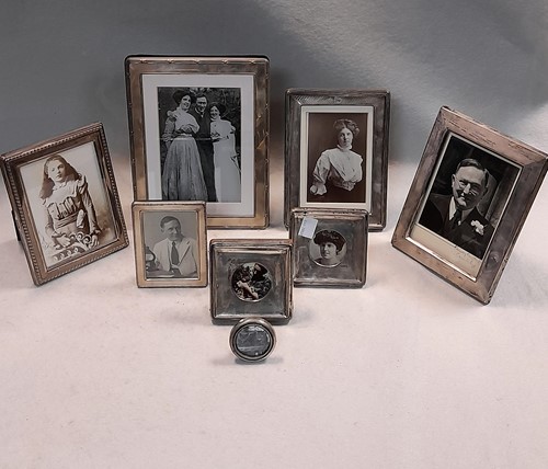 Lot 187 - A collection of 8 silver fronted photograph...