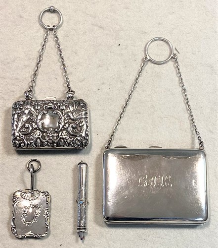 Lot 285 - A quartet of lady's silver evening requisites