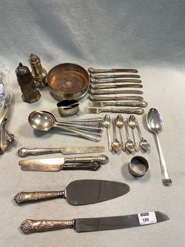 Lot 189 - A collection of silverware including casters,...
