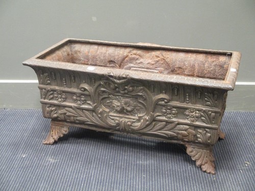 Lot 420 - A Victorian style cast metal trough planter on...