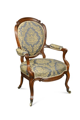 Lot 347 - An early Victorian carved walnut open armchair