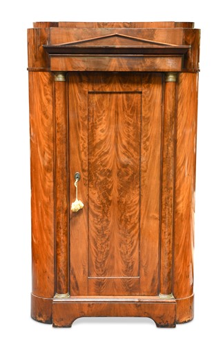 Lot 340 - An Empire mahogany standing corner cupboard