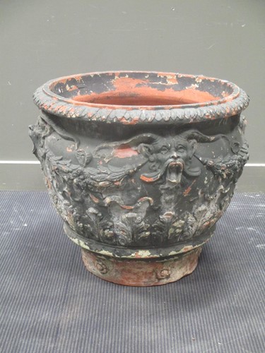 Lot 432 - A large painted terracota circular planter...