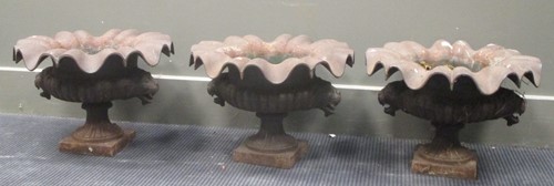 Lot 439 - Three metal campana shaped urns with wavy...