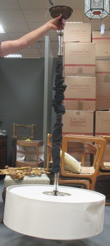 Lot 632 - A modern five light ceiling light with bronzed...