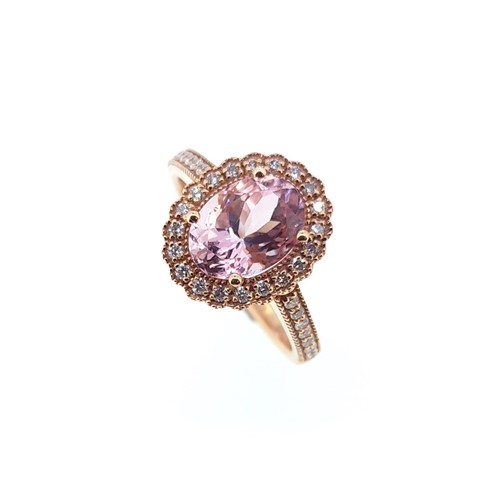Lot 165 - A morganite and diamond cluster ring