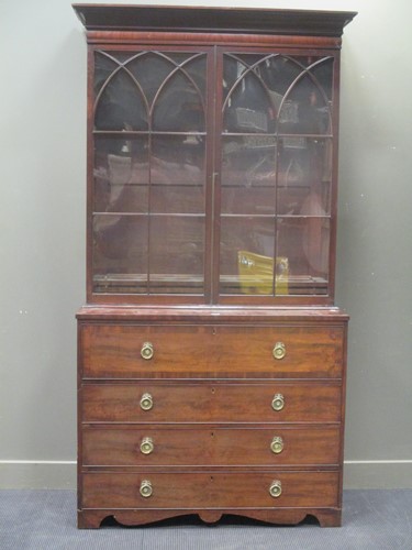 Lot 441 - A George III mahogany secretaire bookcase, the...