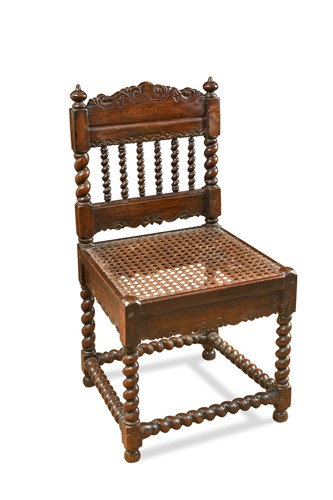 Lot 181 - A late 17th century Dutch-Ceylonese hardwood low chair