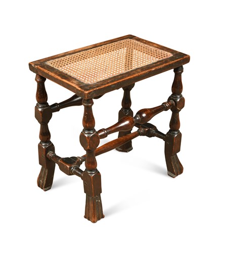 Lot 185 - A William and Mary walnut caned seated stool