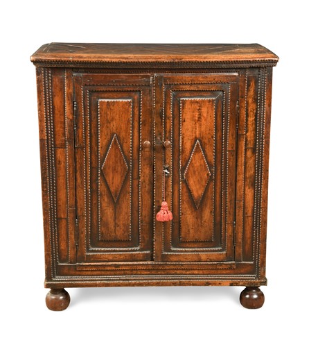 Lot 145 - A  French provincial walnut side cabinet, 19th century