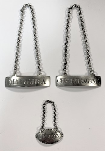 Lot 268 - A trio of rare George III 18th century decanter labels