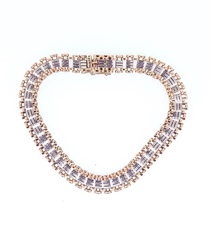 Lot 141 - A bi-colour fancy link bracelet
