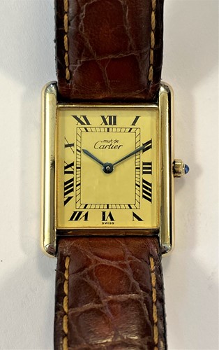 Lot 236 - Cartier - A vermeil 'Tank' wristwatch
