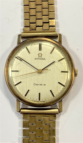 Lot 246 - Omega - A gentleman's 9ct gold 'Geneve' wristwatch on a 9ct gold bracelet
