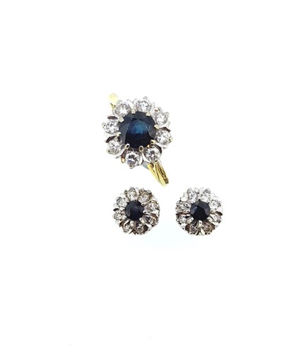 Lot 179 - A sapphire and diamond cluster ring together with a pair of cluster ear studs