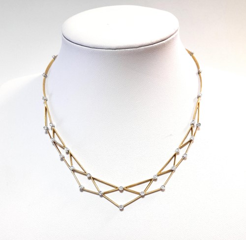 Lot 111 - A modern diamond set lattice bib necklace
