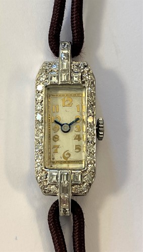 Lot 255 - Unsigned - A lady's diamond set cocktail watch