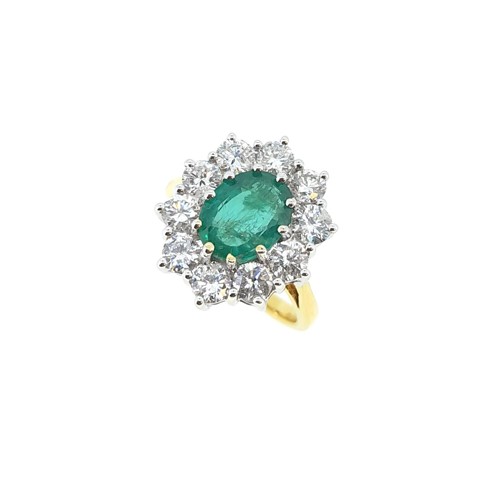 Lot 209 - An 18ct gold emerald and diamond cluster ring