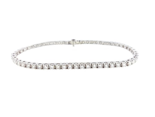 Lot 176 - An 18ct white gold diamond line bracelet
