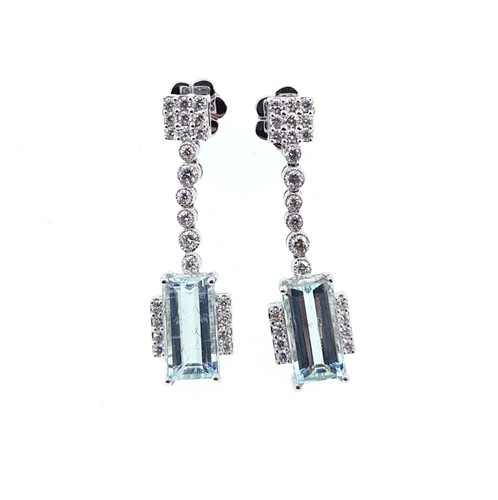 Lot 103 - A pair of Art Deco style aquamarine ear pendants