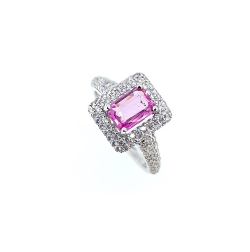Lot 164 - A pink sapphire and diamond cluster ring