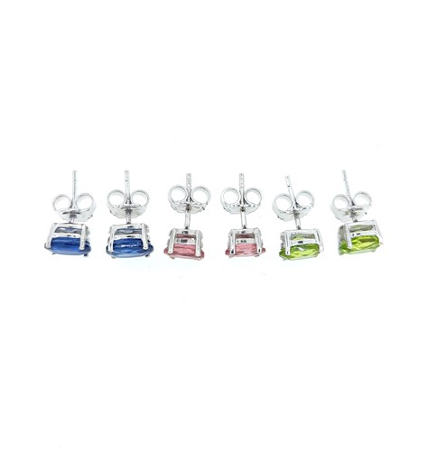 Lot 4 - A set of three gem set ear studs