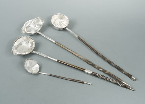 Lot 349 - A George III silver punch ladle by Hester Bateman together with three others