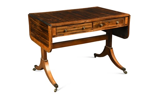 Lot 348 - A Regency calamander and satinwood veneered sofa table