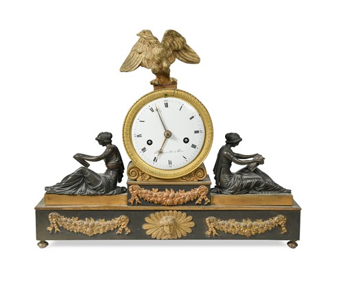 Lot 236 - A French Empire gilt metal and bronze mantel clock