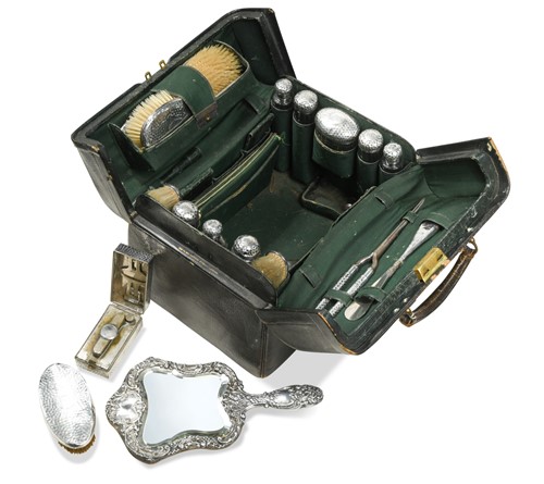 Lot 298 - A Victorian portmanteau style travelling dressing case
