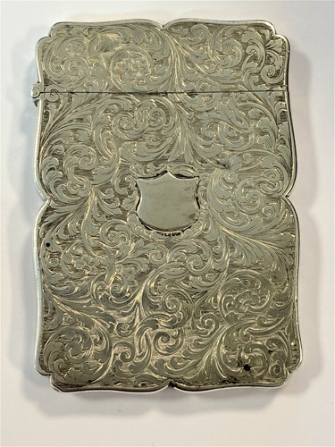 Lot 283 - A Victorian silver card case by Nathaniel Mills