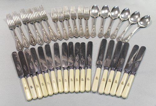 Lot 400 - An 18 piece set of George V silver flatware with 18 additions