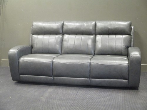 Lot 377 - A modern grey leather three seater sofa with...
