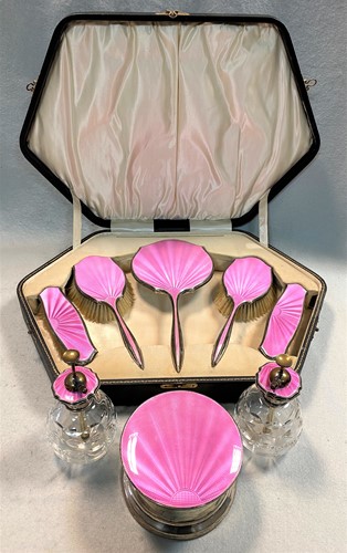 Lot 297 - A George V silver and enamel 8 piece dressing table set